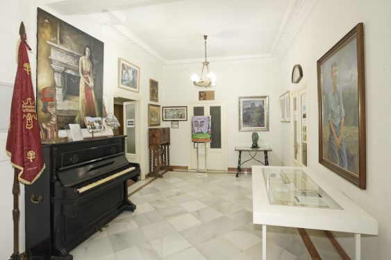 Foyer of the Artistic, Literary and Scientific Center of Granada, housing the piano once played by the young member Federico García Lorca.