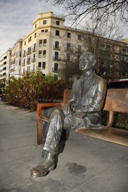 Sculpture of Federico García Lorca located on the promenade of Avenida de la Constitución in Granada.