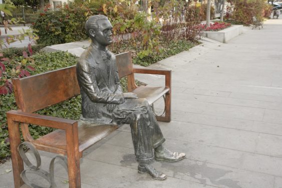 Sculpture of Federico García Lorca located on the promenade of Avenida de la Constitución in Granada.